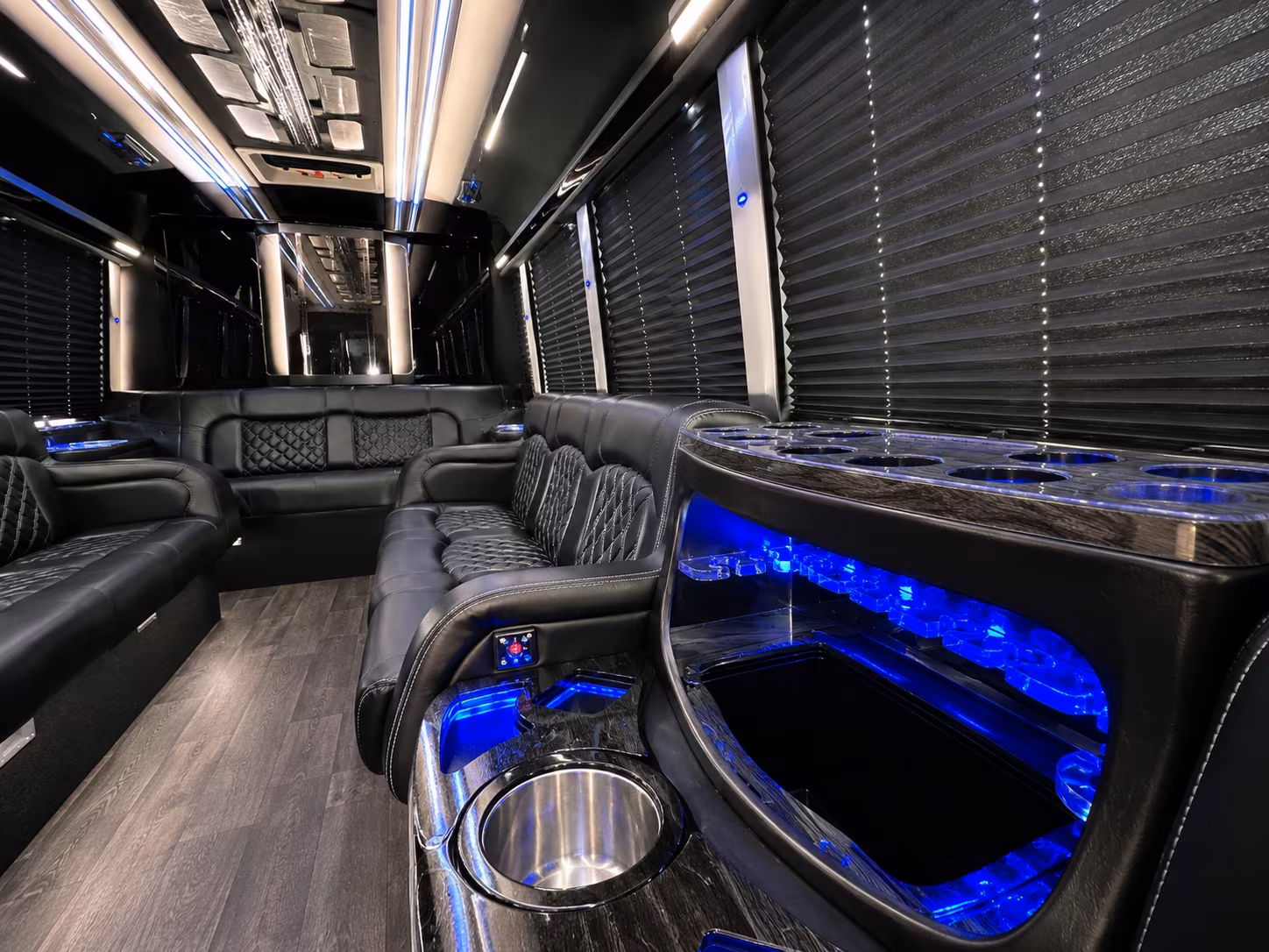 Wedding guests seated inside a party bus serving Daytona Beach